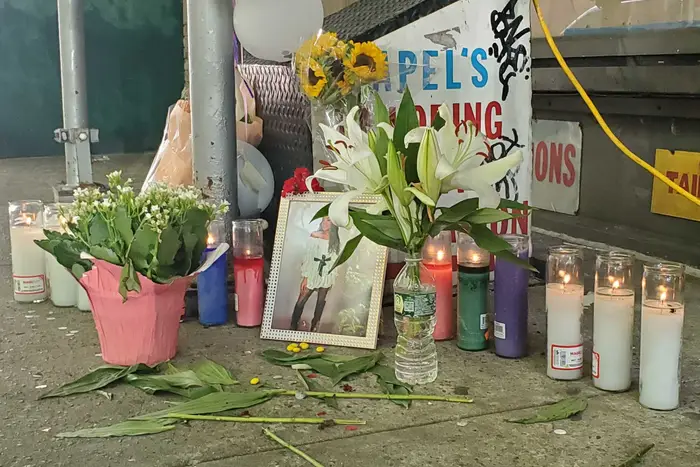 A sidewalk memorial set up for the victim of a homicide in Kips Bay, seen on July 8, 2024.